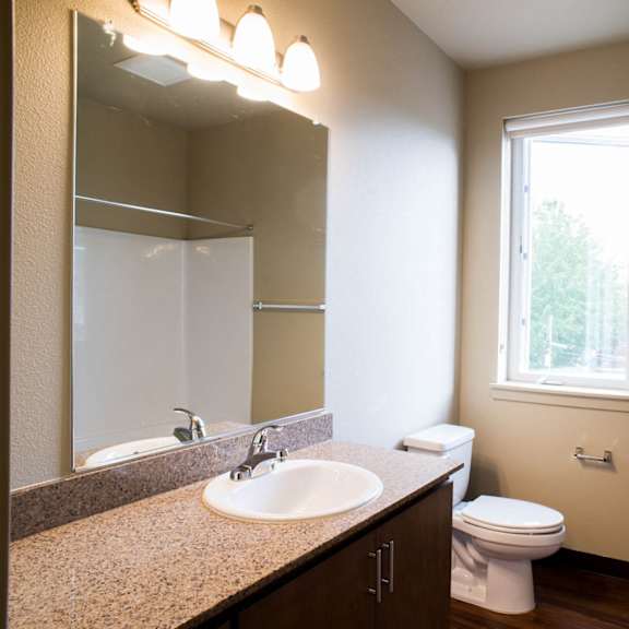 bathroom with vanity lights at quinten tower, portland