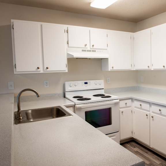 fully equipped kitchen at wingsong manor apartments, portland
