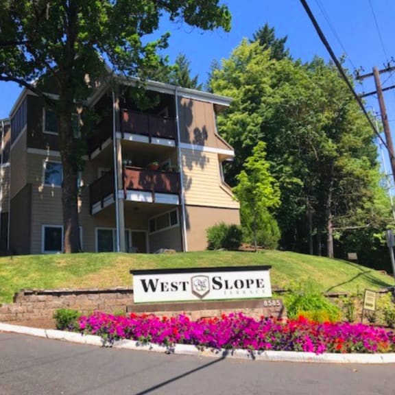 a view of the west slope apartments from the street