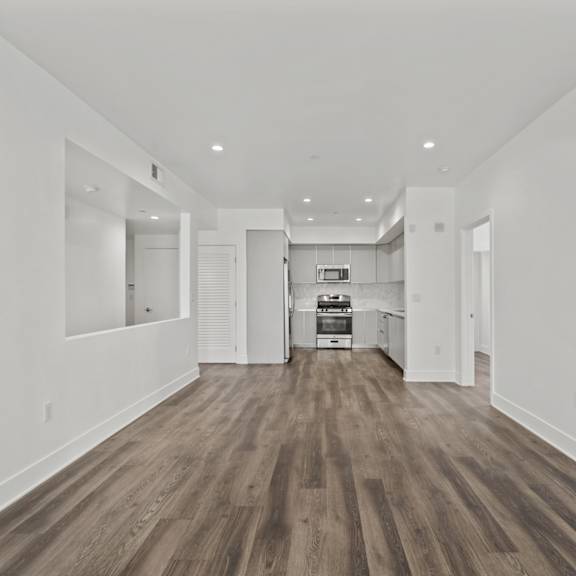 open-concept living room, dining room, and kitchen