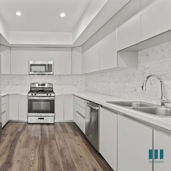 kitchen with stainless-steel appliances with ample cabinet storage