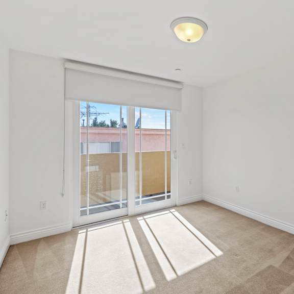 bedroom with balcony