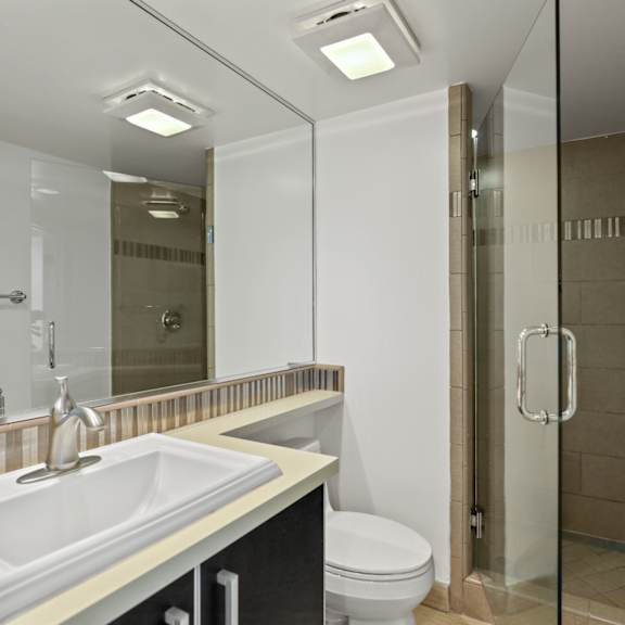 bathroom with stand-up shower with glass door