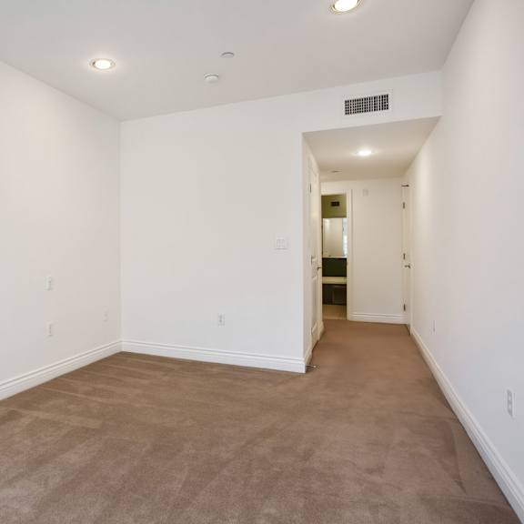 bedroom with recessed lighting