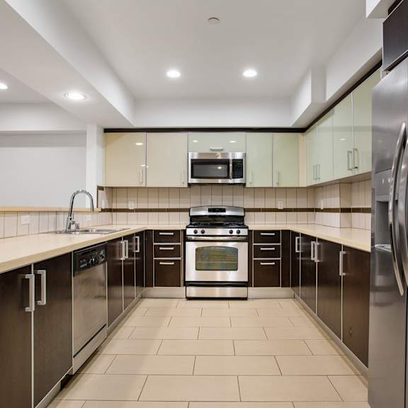 large-size kitchen with energy-efficient appliances with ample cabinet storage