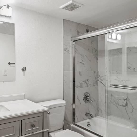 bathroom with full-size bathtub
