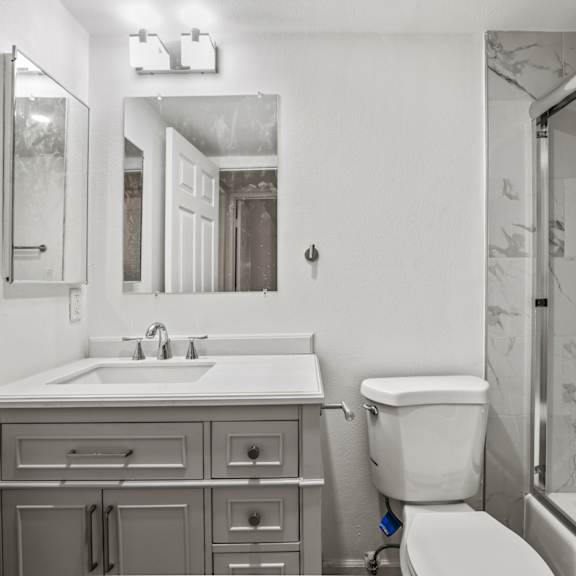 full-size bathroom with bathtub