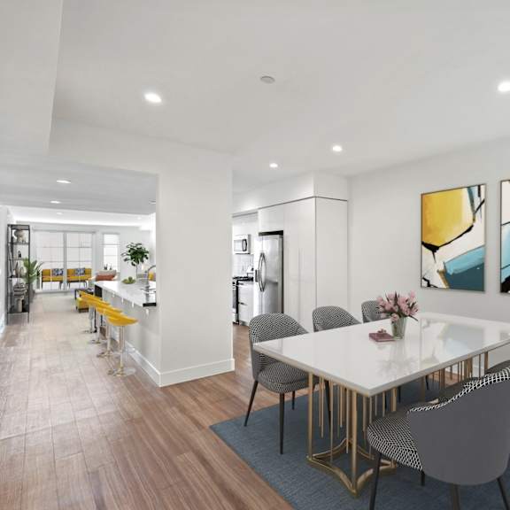 open-concept kitchen, dining, and living room space