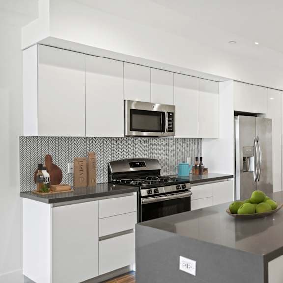 kitchen with energy-efficient appliances and countertop bar
