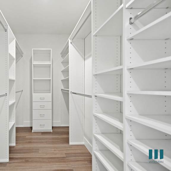 large-size walk-in closet with built-in organizers