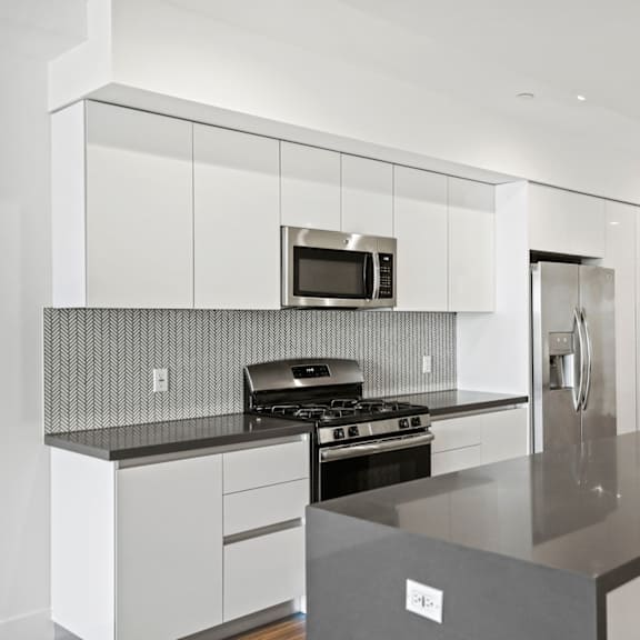 open-concept kitchen with countertop bar