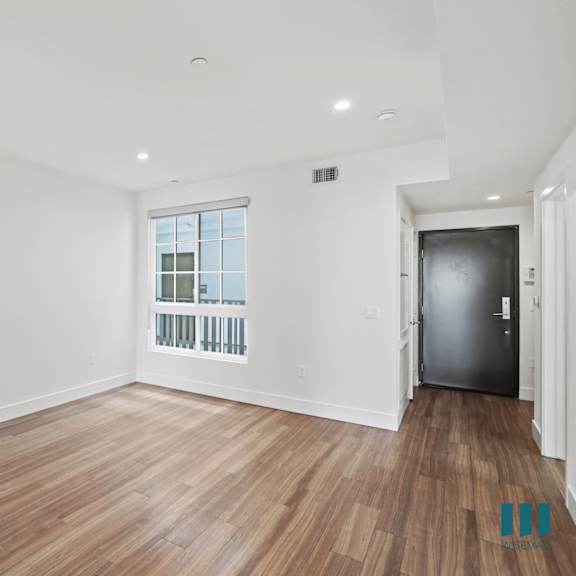 front entrance of unit and dining room space