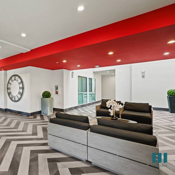 lobby area with seating and a resident package locker