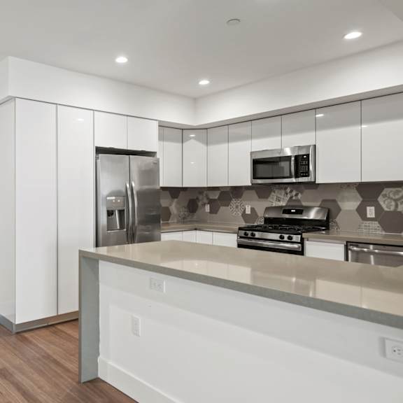 front entry of apartment and kitchen