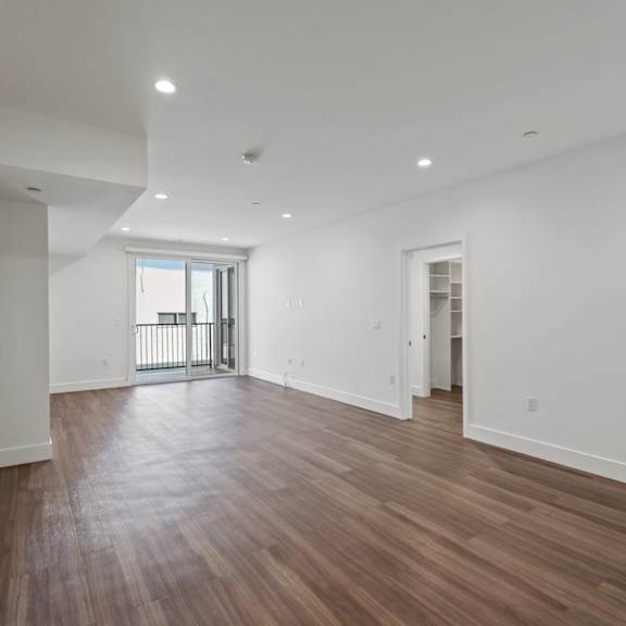 dining and living room with patio