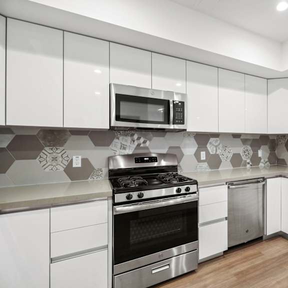 kitchen with energy-efficient stove and microwave oven