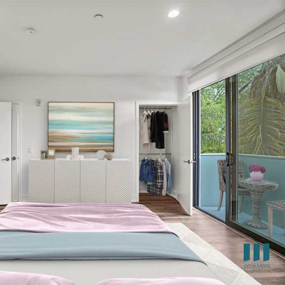 large-size bedroom with walk-in closet with shelving, recessed lighting, vinyl flooring, and patio