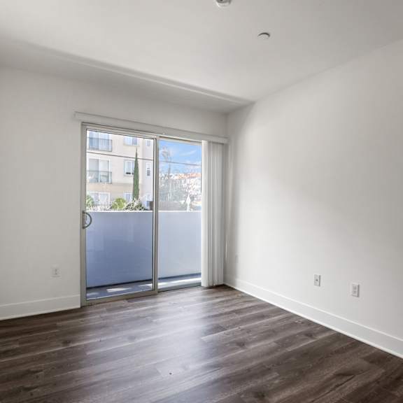 bedroom with balcony
