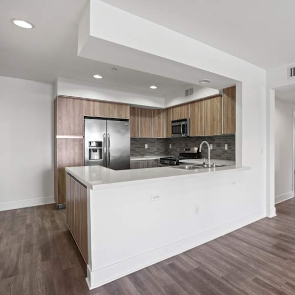 kitchen with countertop bar and dining area