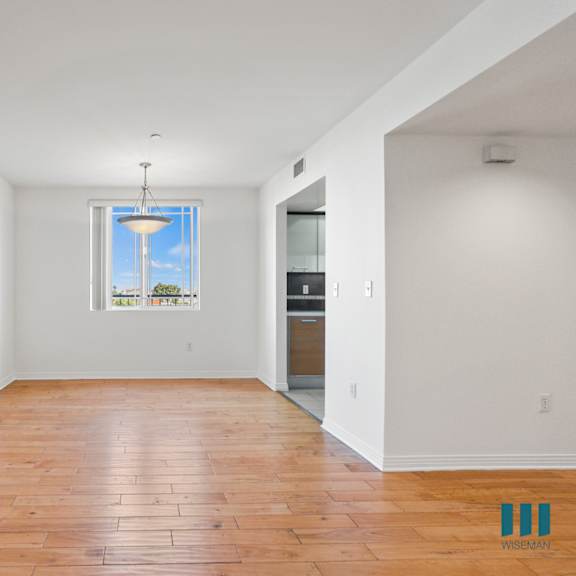dining room with window and vinyl flooring
