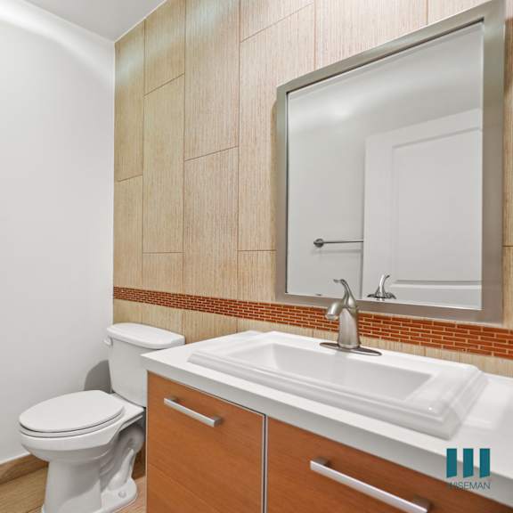 bathroom with vanity cabinet storage