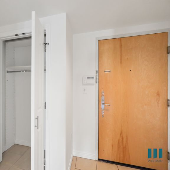 front entrance of apartment, hall closet,  and bathroom