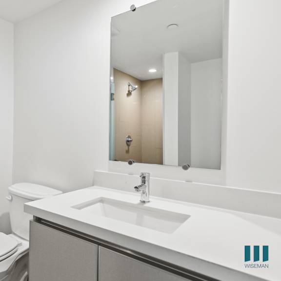 bathroom with vanity cabinet storage