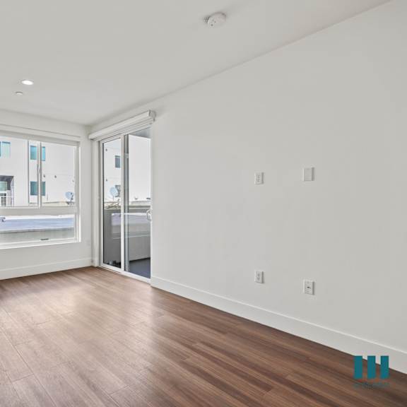 living room with vinyl flooring, recessed lighting, large-size windows,and patio