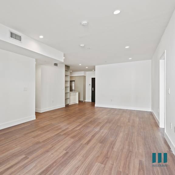 dining and living room with recessed lighting and vinyl flooring