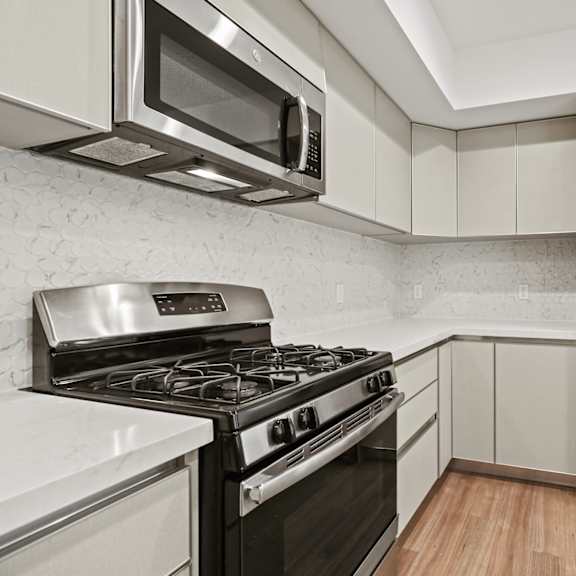 kitchen with stainless-steel refrigerator, stove, and microwave oven
