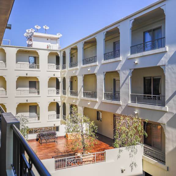 courtyard of armacost manor by wiseman