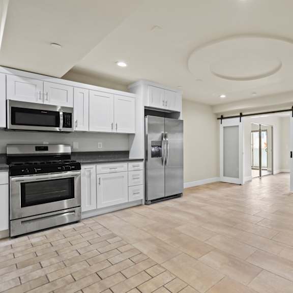kitchen, dining, and living room