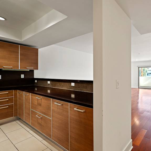 kitchen, dining, and living room areas