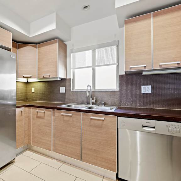 kitchen with energy-efficient refrigerator and dishwasher