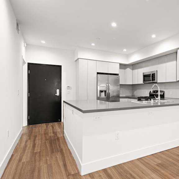 open-concept kitchen and dining space
