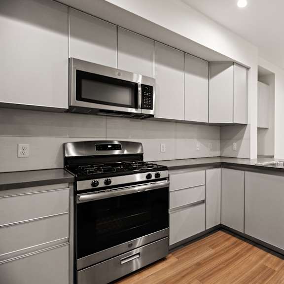 kitchen with energy-efficient appliances and ample cabinet storage