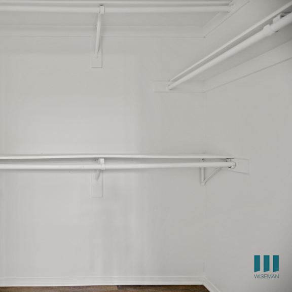 walk-in closet with double hanging rods