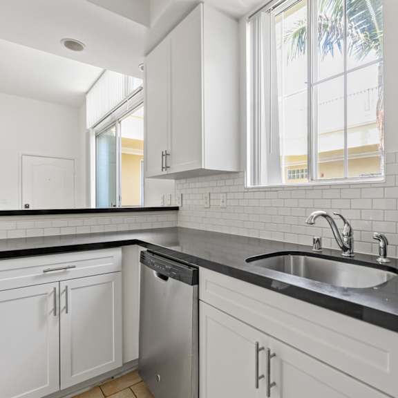 full-size kitchen in studio apartment