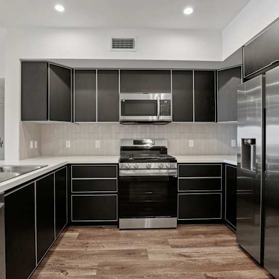 kitchen with energy-efficient appliances and ample cabinet storage