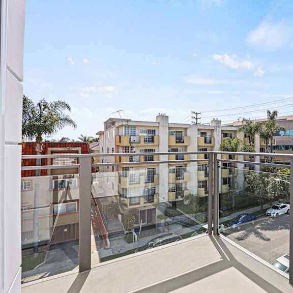 a view of a building from a balcony