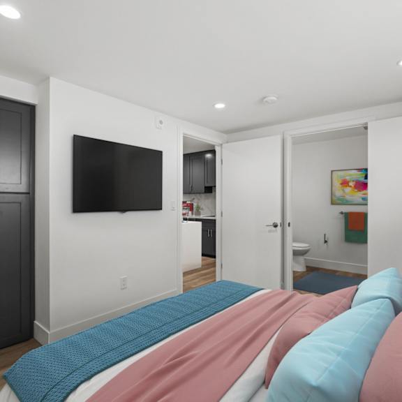bedroom with built-in cabinet storage