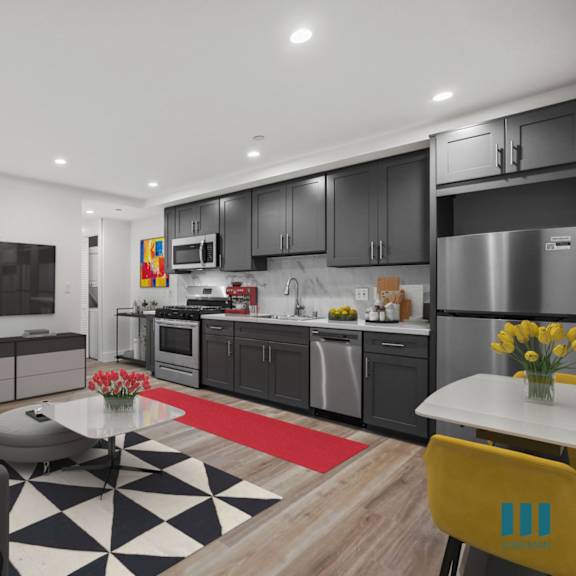 open-concept kitchen, dining, and living room space