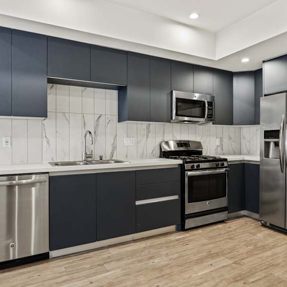 kitchen with stainless-steel refrigerator, stove, microwave oven, and dishwasher