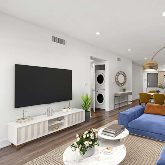open-concept kitchen, dining, and living room s with in-suite washer & dryer