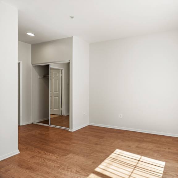 bedroom with closet and window