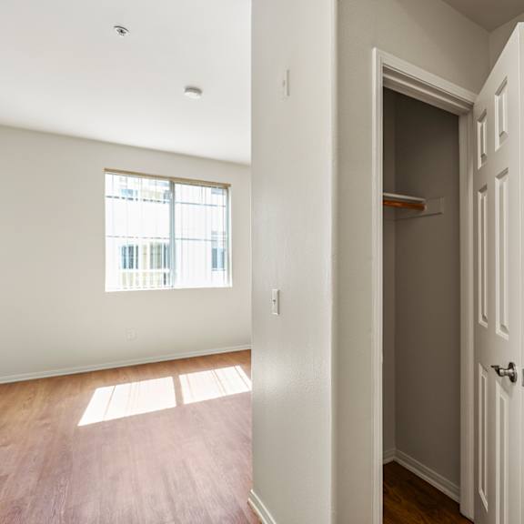 hall closet with hanging rod