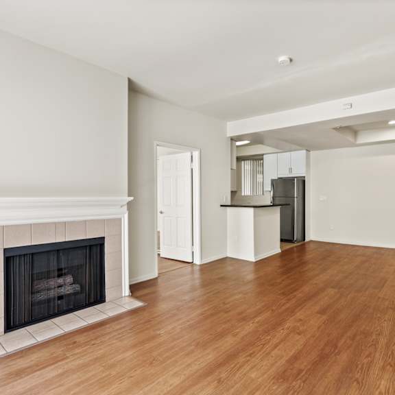 open-concept kitchen, dining, and living room space