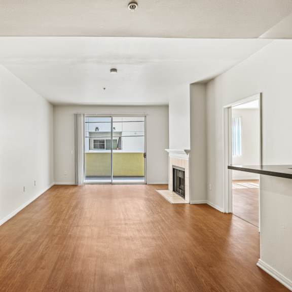 open-concept kitchen, dining, and living room space