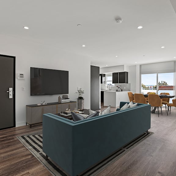 open-concept kitchen, dining, and living room space