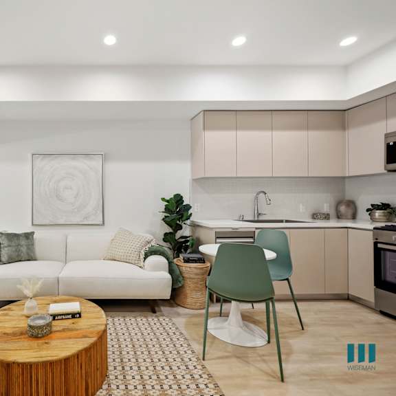 spacious patio and open-concept living room, dining, and kitchen